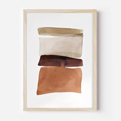 Framed abstract art with brown and beige shapes on a white background