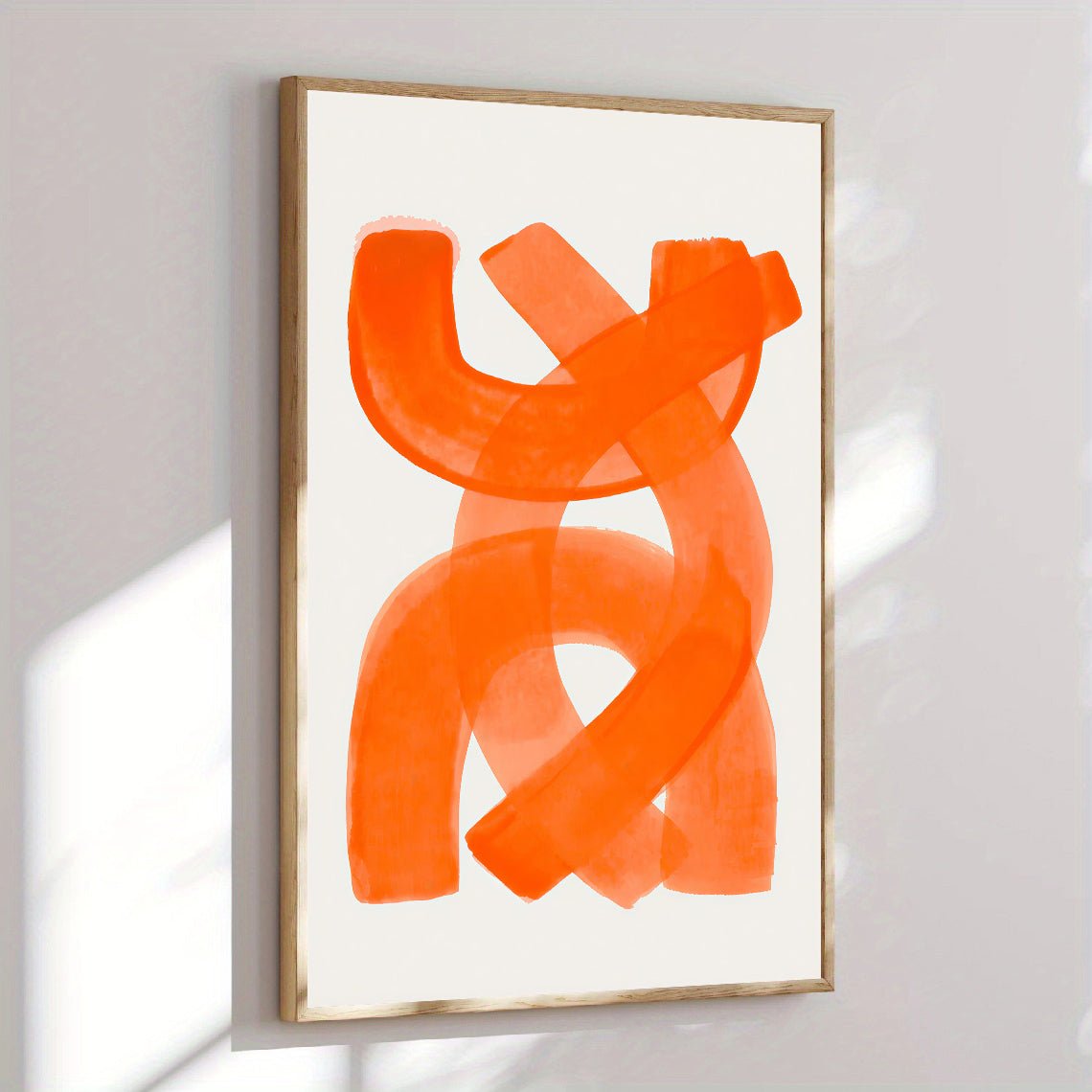 Abstract orange artwork on a white background with a gold frame.