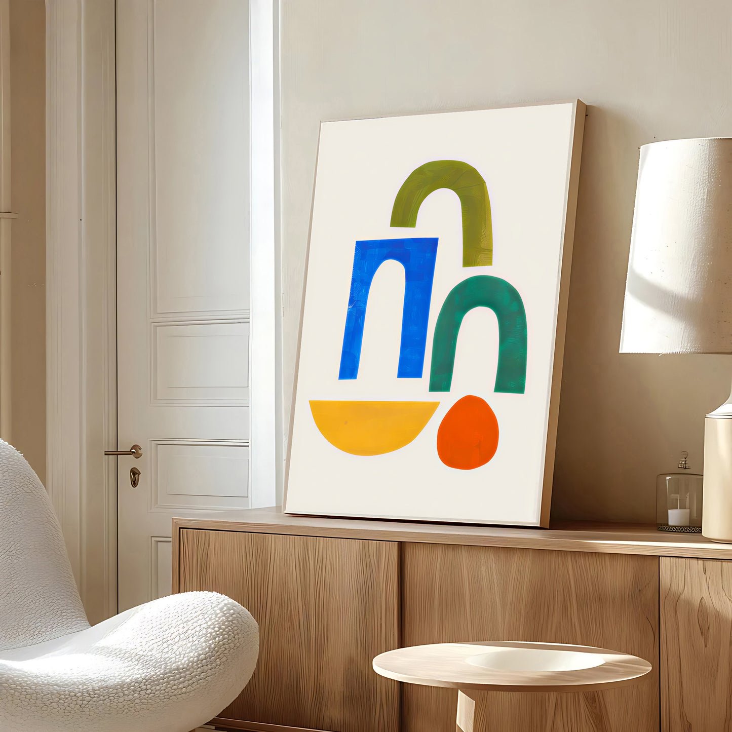 Modern interior with abstract art on a wall, white chair, and wooden cabinet.